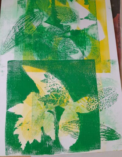 Craigmillar Community Grows: Prints of green and yellow leaves on a white background.