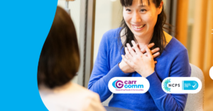 A person sitting at a table with their hands on their chest. Carr Gomm and NCPS logos are featured.