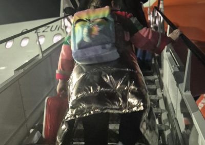 Edina boarding her first plane