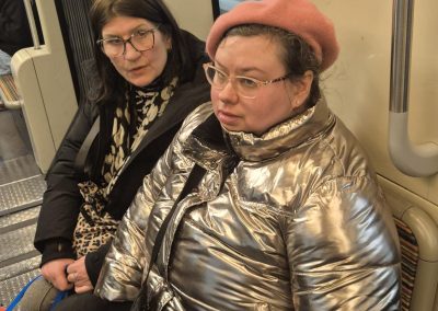 Edina and her Support Practitioner on the metro